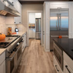 Custom kitchen with Wolf Range and pantry