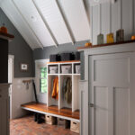 Brick floor with built ins entry room